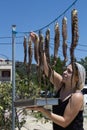 Woman preparing octopus. Greece . 02 Jul 2018. Royalty Free Stock Photo