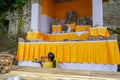 Woman preparing offering at Goa Gajah temple, Elephant cave, famous landmark Hindu, Bali, Indonesia,14.08.2018 Royalty Free Stock Photo