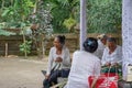 Woman preparing offering at Goa Gajah temple, Elephant cave, famous landmark Hindu, Bali, Indonesia,14.08.2018 Royalty Free Stock Photo