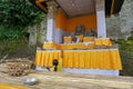 Woman preparing offering at Goa Gajah temple, Elephant cave, famous landmark Hindu, Bali, Indonesia,14.08.2018 Royalty Free Stock Photo