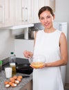 Woman preparing omelet Royalty Free Stock Photo