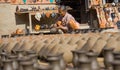 Woman preparing pottery in Bhaktapur