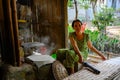 Woman preparing rice paper rolls in Vietnam