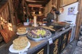 Woman preparing some traditional Chinese snaks in Lijiang Old Town