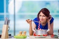 The woman preparing soup in the kitchen Royalty Free Stock Photo