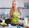 Woman preparing tigres espanol with mussels indoors