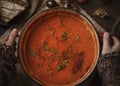 Woman preparing tomato soup at the kitchen Royalty Free Stock Photo