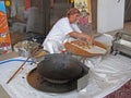 Woman preparing Turkish pizza