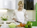 Woman preparing vegetarian salad