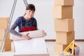 The woman preparing for wallpaper work Royalty Free Stock Photo