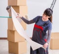 Woman preparing for wallpaper work Royalty Free Stock Photo