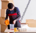 Woman preparing for wallpaper work Royalty Free Stock Photo