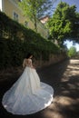 Woman is preparing for wedding. Happy bride before wedding. Wonderful bridal gown. Beautiful wedding dresses in boutique