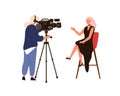 Woman presenter talking sitting on chair during newscast shooting. Video operator or cameraman holding camera with Royalty Free Stock Photo