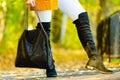 Woman presenting high knee black boots