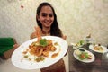 A woman presents a special menu at the Chinese New Year