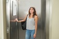 Woman Pressing Elevator Button Royalty Free Stock Photo