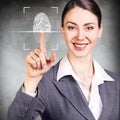 Woman pressing on virtual button with dactyloscopy scanner. Royalty Free Stock Photo