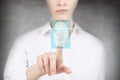 Woman pressing on virtual button with dactyloscopy scanner.