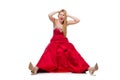 Woman in pretty red evening dress isolated on Royalty Free Stock Photo