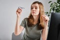 Woman procrastinate at home office workplace Royalty Free Stock Photo