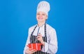 Woman professional chef hold whisk and pot. Whipping like pro. Girl in apron whipping eggs or cream. Start slowly Royalty Free Stock Photo