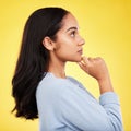 Woman, profile and studio with a young model thinking with casual fashion feeling relax. Isolated, yellow background and Royalty Free Stock Photo