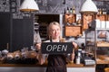 Woman promoting newly opened coffee shop