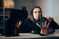 Woman Protecting her Laptop Screen Worried about Internet Security Royalty Free Stock Photo