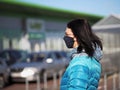 Shopping woman with protective mask Royalty Free Stock Photo