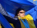 Woman Protester Bearing the Ukrainian Flag