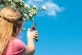 Woman pruning blooming fruit tree in garden Royalty Free Stock Photo