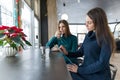 Woman psychologist counseling talking to a young girl