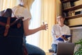 Woman psychologist working with teen girl in office. Royalty Free Stock Photo