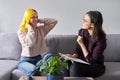 Woman psychologist working with teen girl Royalty Free Stock Photo