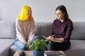 Woman psychologist working with teen girl Royalty Free Stock Photo