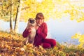 Woman with pug dog Royalty Free Stock Photo