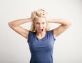 Woman pulling her hair out Royalty Free Stock Photo