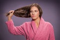 Woman pulling her strong hair Royalty Free Stock Photo