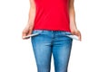 Woman pulling out empty pockets isolated on white Royalty Free Stock Photo