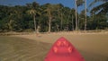 Woman pulls canoe with paddle to azure sea water from beach Royalty Free Stock Photo