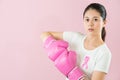 Woman punch boxing gloves together