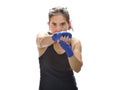 Woman punching boxing pads