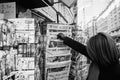 Woman purchases a Die Zeit german newspaper from a newsstand