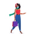 Woman with purchases wearing mask to prevent coronavirus pandemic new year christmas shopping Royalty Free Stock Photo