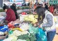 Woman Purchasing at Market