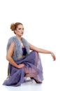 Woman with purple dress sitting Royalty Free Stock Photo