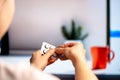 Woman Pushing Out Pills or Tablets From Blister Packaging at Home. Taking Painkiller, Antibiotic, Medicament, Placebo