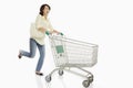 Woman pushing a shopping cart