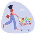 woman pushing supermarket shopping cart Royalty Free Stock Photo